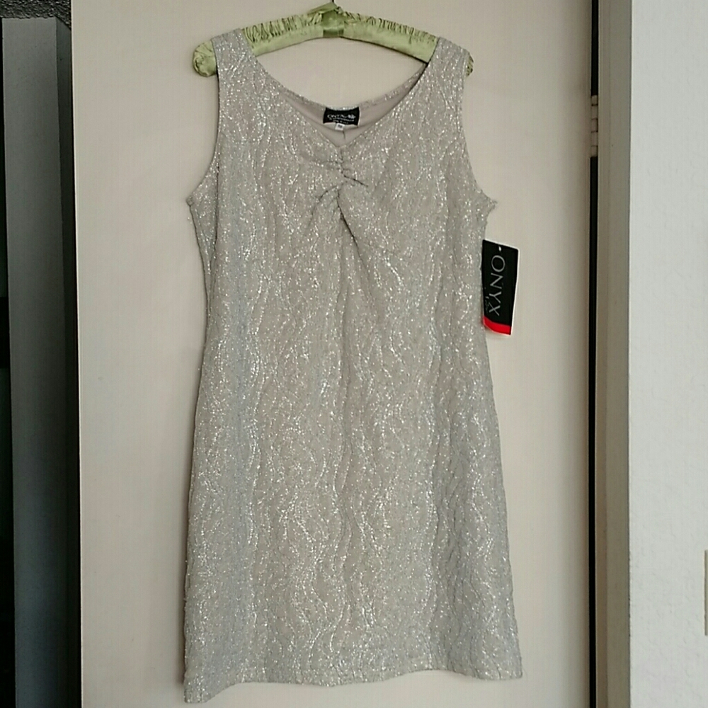 Shimmering, silver cocktail dress